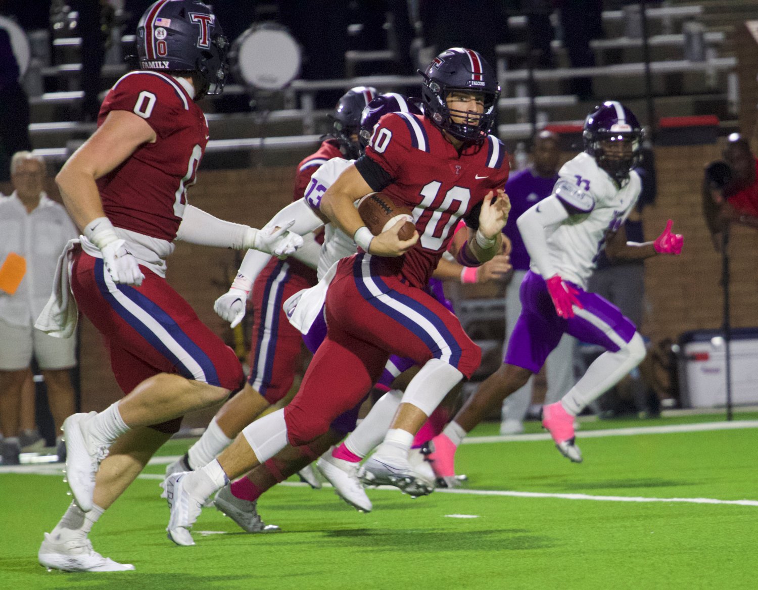 Wyatt Young runs downfield during Thursday's game between Tompkins and Morton Ranch at Rhodes Stadium.
